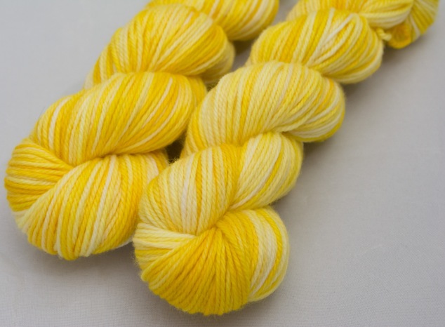 I bought two of these amazingly sunny yellow skeins. I might put them into my Autumn coloured throw somehow, we'll see when I get them ;)